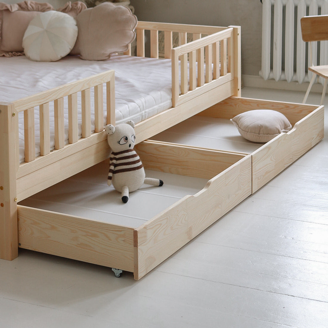 Detalle de doble cajón inferior para cama infantil
