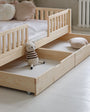 Detalle de doble cajón inferior para cama infantil
