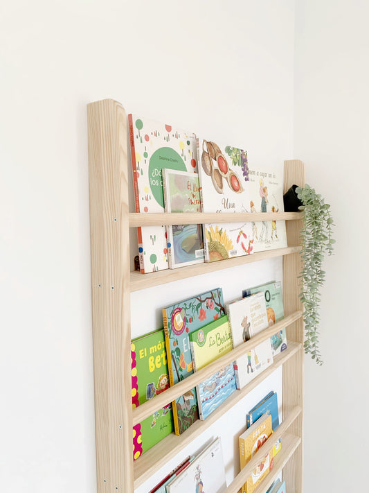 Side view of the Lisa Montessori Bookstore for children with children's books on display, encouraging autonomy in reading.